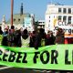 Extinction Rebellion protesters with Rebel For Life Banner in Street