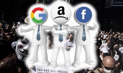 Google Facebook, Amazon Logo Men in front of demonstrators