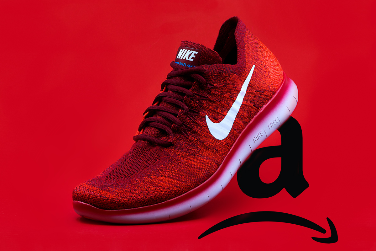 Nike Shoe steps on Sad Amazon Logo