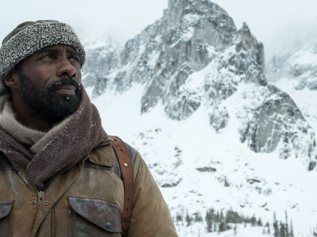Idris Elba in promotional photo from The Mountain Between Us