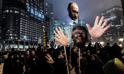 Putin and Trump puppets in parade