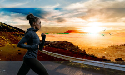 A girl running with great concentration in front of a beautiful sunset