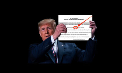 trump holding misspelled document