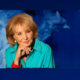 Barbara Walters shown in front of ABC TC backdrop
