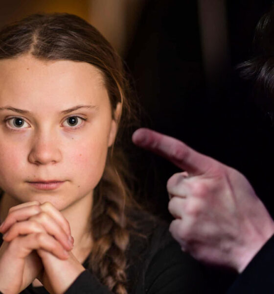 Elon Musk photo wagging finger at photo of Greta Thunberg: collage