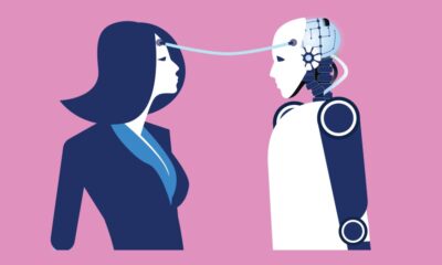 lady and robot are connected by a tube from brain to brain